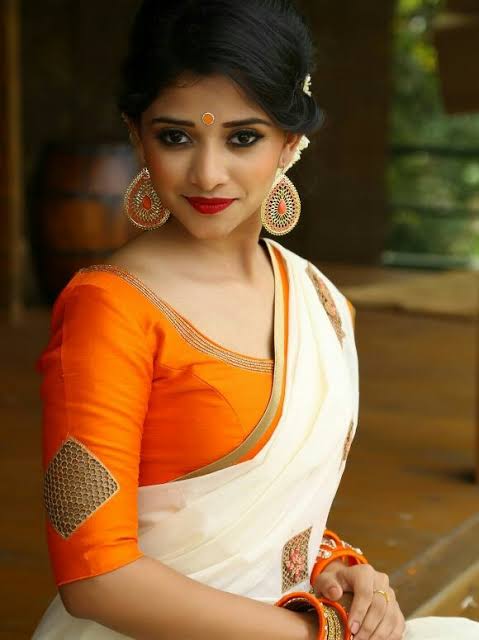 orange blouse design for kerala saree