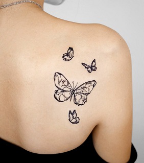 Butterfly tattoo in shoulder
