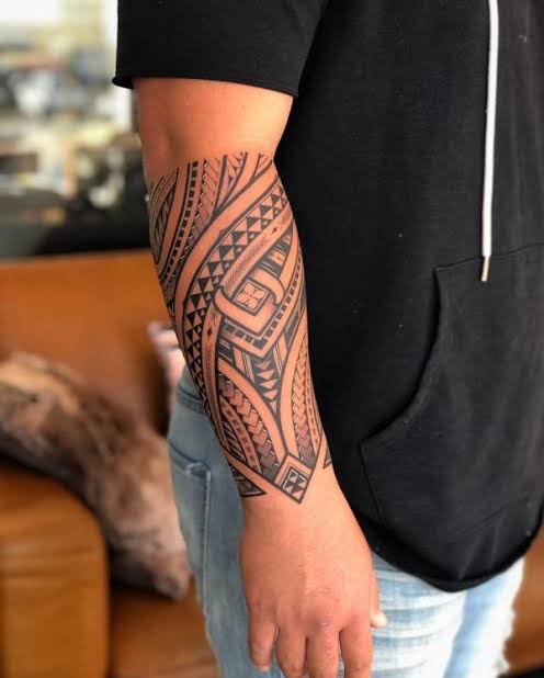 Matai Tattoo - Four arm wrapp with script name freehand,... | Facebook